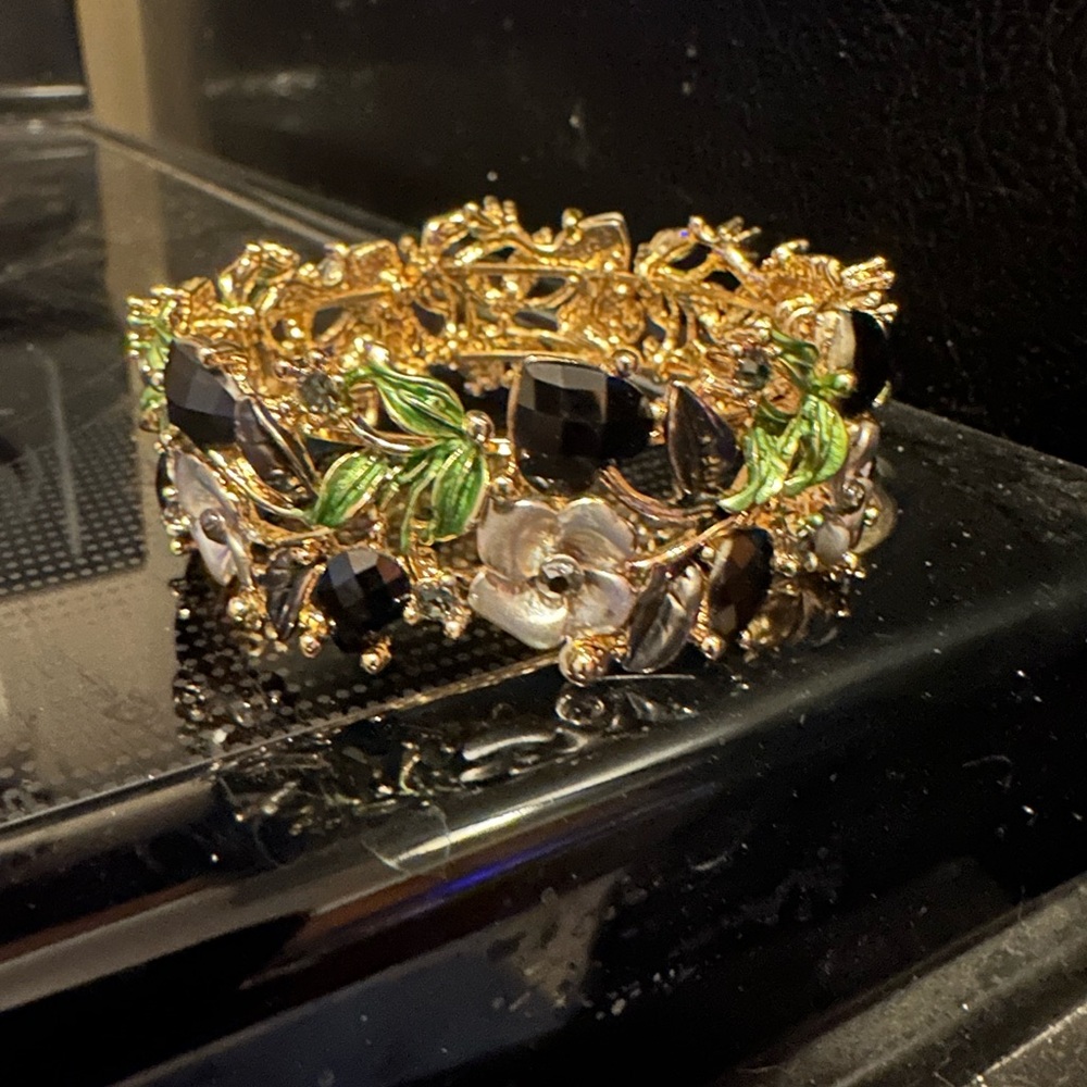 Elegant Gold and Black Floral Bracelet with silver & gold colors.